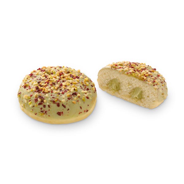 Berlina con cobertura y trozos de pistacho rellena de crema sabor pistacho